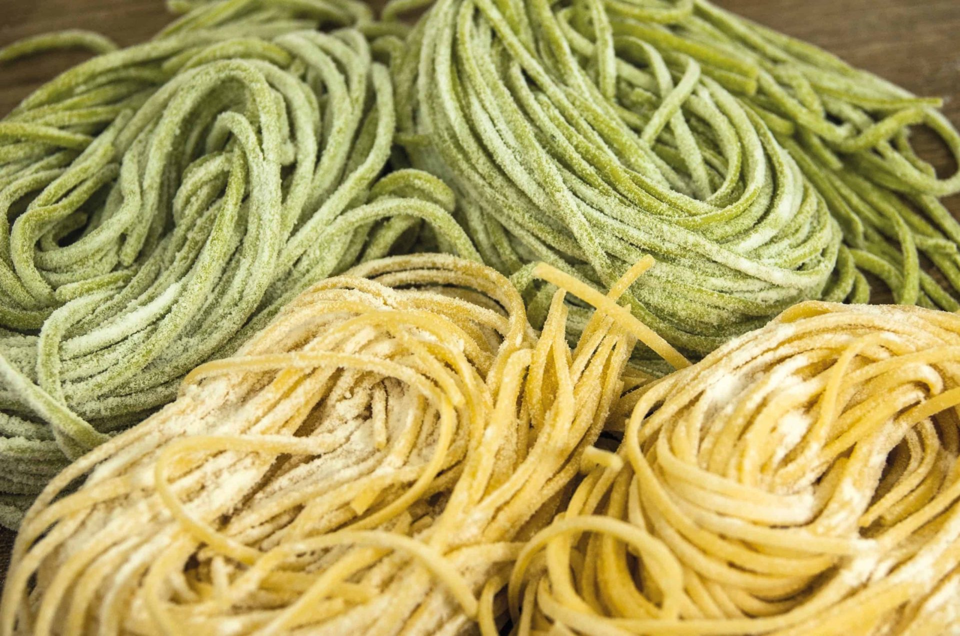dried pasta noodles in green and yellow color